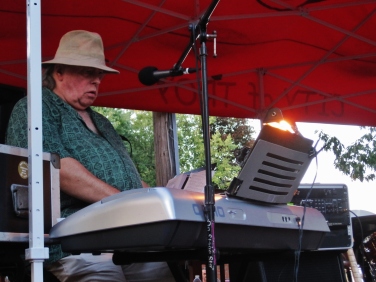 Emerald City keyboardist and vocalist, Gary Tash, performing live on stage at the 5th Annual Power In The Park Classic Car Show & 8th Annual Uncle Sam Jam, held at Power's Memorial Park in Troy,NY, Saturday, August 30, 2014. (c) Amy L. Modesti, 2014
