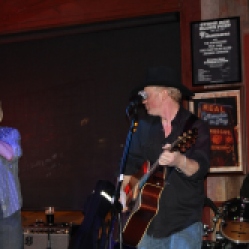 Peter Bearup, Charlie Morris, and part of Bob Resnick from The Coveralls band performing their first live concert at the Dinosaur Bar-B-Que Restaurant in Troy, NY Photo taken by Amy L. Modesti with Canon Rebel SL1 on Friday, January 30, 2015. (C): Amy Modesti, 2015