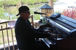 Barry Jones, E.B. JEB Band pianist and guitarist, playing the piano during his first set at The Mill Of Round Lake, located in Round Lake, NY. Photo taken by Amy L. Modesti on Saturday, May 23, 2015 with Canon Rebel SL1 Digital SLR Camera. (C): Amy Modesti, 2015