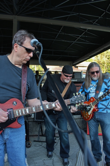 E.B. Jeb guitarists, Bernie Mignacci, Barry Jones, and Pete Jones performing together at The Mill On Round Lake, located in Round Lake, NY. Photo taken by Amy L. Modesti on Saturday, May 23, 2015 with Canon Rebel SL1 Digital SLR Camera. (C): Amy Modesti, 2015