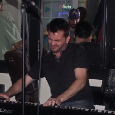 Keyboardist, Jason Ladanye, performing with the Matt Mirabile Band during the band's first performance set at Casey Finn's Pub Grill LLC in Albany, NY. Photo taken by Amy L. Modesti on Friday, May 22, 2015 with her Canon Rebel SL1 Digital SLR Camera. (C): Amy Modesti, 2015