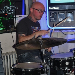 Drummer, Josh Bloomfield, playing the drums during the band's 2nd performance set live at Casey Finn's Pub Grill LLC in Albany, NY. Photo taken by Amy L. Modesti on Friday, May 22, 2015 with her Canon Rebel SL1 Digital SLR Camera. (C): Amy Modesti, 2015