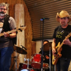Big Frank and the Bargain Bingers featuring Frank Novko (bass guitar/vocals), Bob Resnick (drums), and a local guitarist performing at "Still: DQ 2 For Dick Quinn" concert held at The Hangar in Troy, NY, Sunday, October 11, 2015. Series 1/10. Photo taken by Amy L. Modesti with her Canon Rebel SL1 Digital SLR Camera. (C): Amy Modesti, 2015