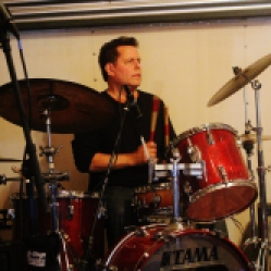 Bob Resnick from "Big Frank and the Bargain Bingers", playing drums at "Still: DQ 2 For Dick Quinn" concert held at The Hangar in Troy, NY, Sunday, October 11,2015. Series 6/10. Photo taken by Amy L. Modesti with Canon Rebel SL1 Digital SLR Camera. (C): Amy Modesti, 2015