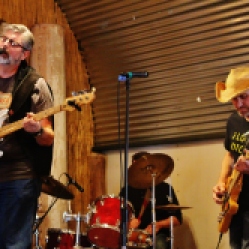 "Big Frank and the Bargain Bingers" featuring Frank Novko (bass guitar/vocals), Bob Resnick (drums), and a local guitarist performing at "Still: DQ 2 For Dick Quinn" concert at The Hangar in Troy, NY, Sunday, October 11, 2015. Series 10/10. Photo taken by Amy L. Modesti with her Canon Rebel SL1 Digital SLR Camera. (C): Amy Modesti, 2015