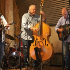 "Jim Gaudet And The Railyard Boys" featuring Kevin Maul (far right, steel guitar), performing at "Still: DQ 2 For Dick Quinn" concert held at The Hangar in Troy, NY, Sunday, October 11, 2015. Series 5/8. Photo taken by Amy L. Modesti with her Canon Rebel SL1 Digital SLR Camera. (C): Amy Modesti, 2015