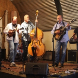 "Jim Gaudet And The Railyard Boys" featuring Kevin Maul (far right, steel guitar), performing at "Still: DQ 2 For Dick Quinn" concert held at The Hangar in Troy, NY, Sunday, October 11, 2015. Series 6/8. Photo taken by Amy L. Modesti with her Canon Rebel SL1 Digital SLR Camera. (C): Amy Modesti, 2015