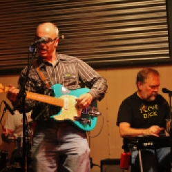 "The Coveralls" Featuring Peter Bearup (electric guitar), Bob Resnick (drums), and Kevin Maul (lap steel), performing at "Still: DQ 2 For Dick Quinn" concert held at The Hangar in Troy, NY, Sunday, October 11, 2015. Series 5/17. Photo taken by Amy L. Modesti with her Canon Rebel SL1 Digital SLR Camera. (C): Amy Modesti, 2015