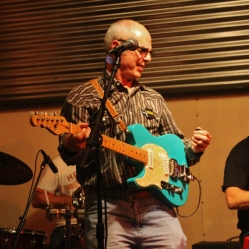 Bob Resnick (drums) and Peter Bearup (electric guitar) from "The Coveralls" performing at "Still: DQ 2 For Dick Quinn" concert held at The Hangar in Troy, NY, Sunday, October 11, 2015. Series 13/17. Photo taken by Amy L. Modesti with her Canon Rebel SL1 Digital SLR Camera. (C): Amy Modesti, 2015