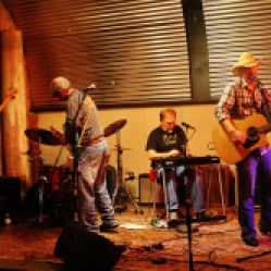 "The Coveralls" Featuring Kyle Esposito (bass guitar), Peter Bearup (electric guitar), Bob Resnick (drums), Kevin Maul (lap steel), and Charlie Morris (acoustic guitar) performing at "Still: DQ 2 For Dick Quinn" concert held at The Hangar in Troy, NY, Sunday, October 11, 2015. Series 16/17. Photo taken by Amy L. Modesti with her Canon Rebel SL1 Digital SLR Camera. (C): Amy Modesti, 2015