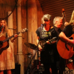The "DoorNellies" featuring Karen Ann (acoustic guitar/vocals), Peggy Lecuyer (mandolin/vocals), Gene Lemme (upright bass), and Mike McMann (acoustic guitar/vocals) performing at "Still: DQ 2 For Dick Quinn" concert held at The Hangar in Troy, NY. Series 8/15. Photo taken by Amy L. Modesti with her Canon Rebel SL1 Digital SLR Camera. (C): Amy Modesti, 2015
