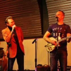 The "Tichy Boys" Featuring a local drummer, Johnny Rabb (vocals), and Graham Tichy (guitar/vocals) performing at "Still: DQ 2 For Dick Quinn" concert held at The Hangar in Troy, NY, Sunday, October 11, 2015. Series 3/19. Photo taken by Amy L. Modesti with her Canon Rebel SL1 Digital SLR Camera. (C): Amy Modesti, 2015